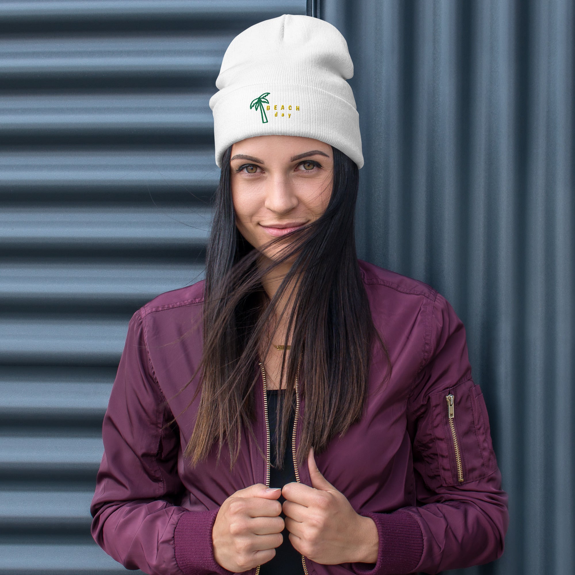 "Embroidered beanie flat lay showing knit texture and custom logo placement"